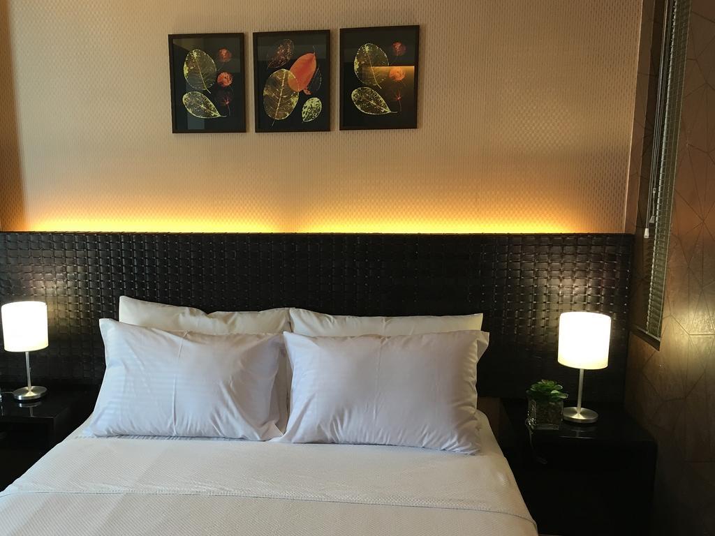 Shang Luxury Suites Mandaluyong Habitación foto