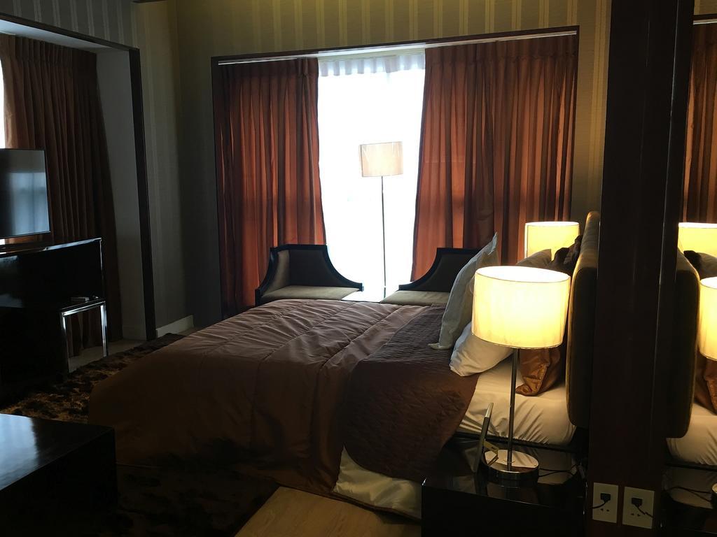 Shang Luxury Suites Mandaluyong Habitación foto